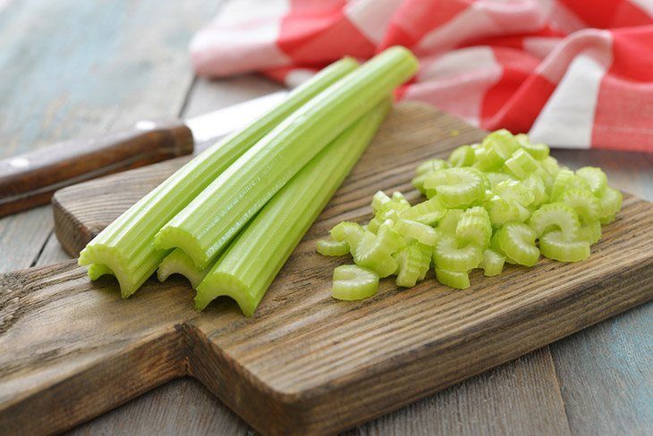 Celery-diced-on-a-cutting-board-how-long-does-celery-last