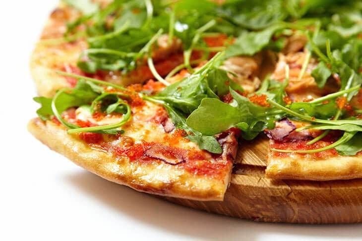 A-seafood-pizza-topped-with-Arugula-how-to-harvest-Arugula